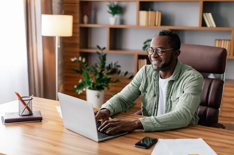cheerful-confident-mature-african-american-busines-2023-11-27-05-30-30-utcLR